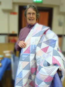 Lucky winner of the prize quilt
